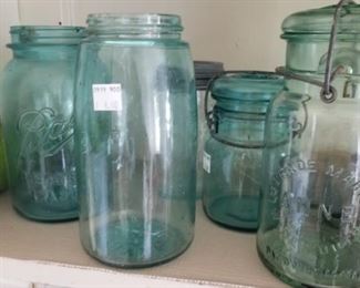 An assortment of many blue ball jars