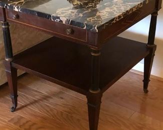 Pair of Italian Empire style mahogany side tables with Nero Portovo marble tops