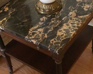 Pair of Italian Empire style mahogany side tables with Nero Portovo marble tops