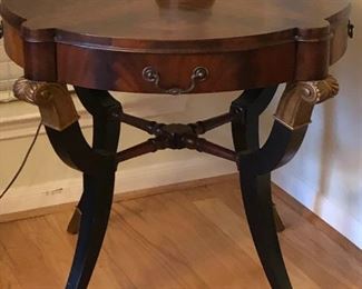 Empire style mahogany center table with book-matched top, circa 1920s-1930s