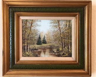 Oil on canvas depiction of a wooded landscape, signed “Isler”