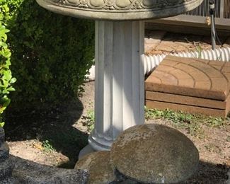 Lots of garden décor including concrete bird bath, etc