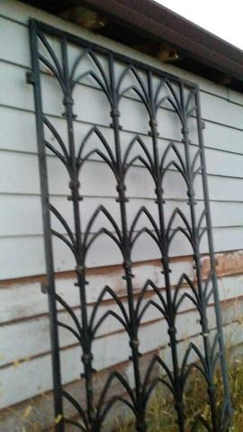 ART DECO WROUGHT IRON GRILL GRATE PANELD FROM AN ART DECO COMMERCIAL BUILDING. DIMENSIONS: 8 FEET 8 INCHES HIGH X 4 FEET 8 INCHES WIDE.