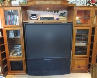 Beautiful entertainment center and TV.  Stereo equipment also.  See pics.