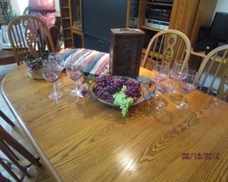 Beautiful oak dining table.  6 chairs/2 leafs.  Very sturdy.  Very good condition 
