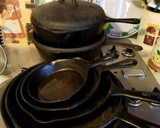 Loaded down with vintage cast iron check out that cast iron Dutch oven