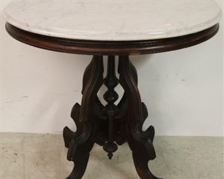 Oval walnut Victorian parlor table