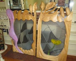 Wood and Stained Glass done by Ruth and her daughter to cover a fireplace. It can obviously be repurposed.