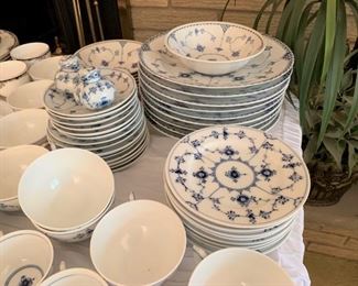 Large set of Royal Copenhagen Blue Fluted includes soup bowls, salad plates, cups and saucers, salt and pepper and more