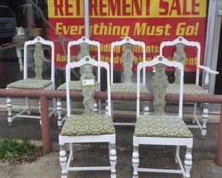 set of six chairs with one armchair