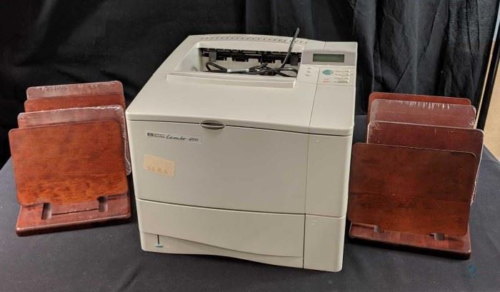 Hewlett Packard LaserJet 4050 printer and desk equipment