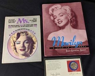 Marilyn Monroe hard cover book, Ms. Magazine and stamps