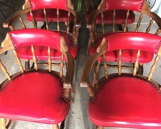 6 red club chairs