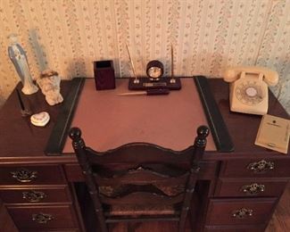 desk with vintage phone and unused rolodex