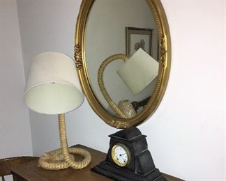 mirror, rope lamp and antique clock