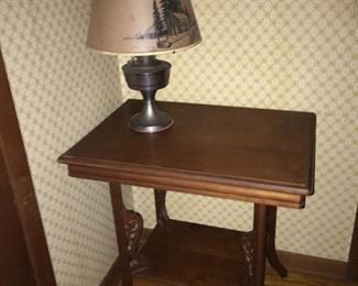 carved table (oil lamp not for sale)