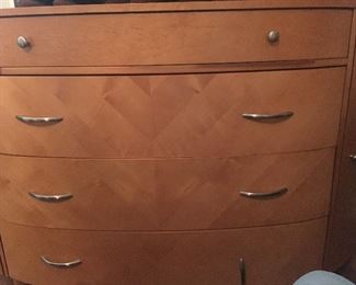 CONTEMPORARY DRESSER WITH SIGHTLY CURVED FRONT