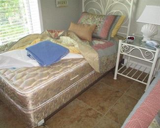 Pair of twin beds with metal white frames