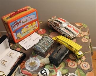 Vintage car and truck toys, vintage banks, and collectible Simpsons lunchbox w/ thermos