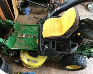 Mower is a 2013 with 137 hours on it and a 2 bag grass catcher. Stored in a shed.