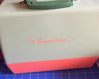 Signature tiny portable sewing machine Sears Roebuck
