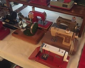some the wee toy sewing machines-many of them-some with original boxes