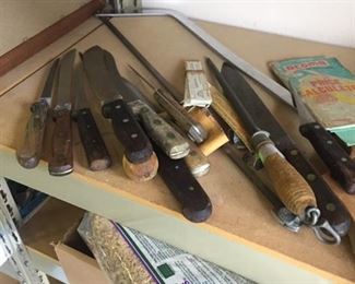 meat saw and old butcher's knives