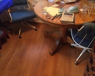 nice 1980s retro dinette with rolling chairs