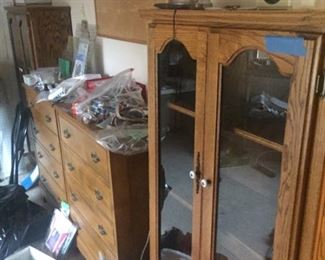 shot of glass bookshelves in sewing room