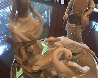 Lladro on silver-plate plateau
