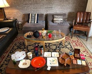 Mid Century Office Chair and glass coffee table with glass suspended over the top; MCM items as well.