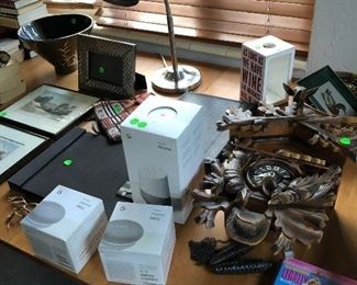 Google Home system brand new in original packing; MCM cuckoo clock from Germany; British engravings framed.