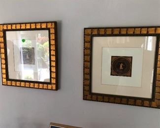 Framed engravings.