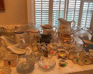 Can you say pitchers? Glass, porcelain, big, medium & small & gravy boats perfect for thanksgiving gravy!!!