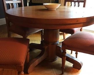 Vintage oak table with 4 solid chairs.