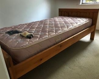 Solid This End Up twin bed.