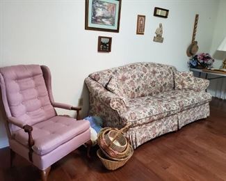 Sofa and accent chair; wall hangings, baskets, lamp, etc.