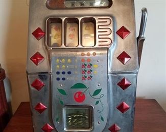 5¢ Bar Top Slot Machine ready to go in your man cave.