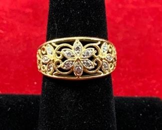Intricate 14 Karat Gold Ring with Diamonds