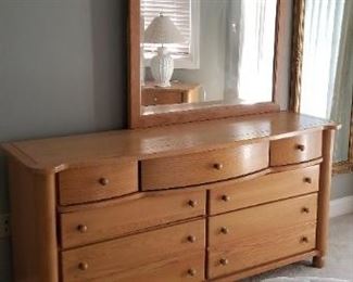 Solid wood bedroom set: dresser with mirror, two nightstands, queen bed. Manufactured by Webb of Virginia