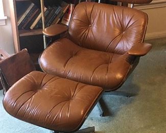 Eames style Lounge Chair and Ottoman. We will verify it by end of the weekend before opening day of the sale