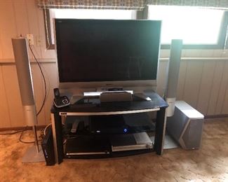 Nice flat screen tv Panasonic and Panasonic surround sound system tv stand 