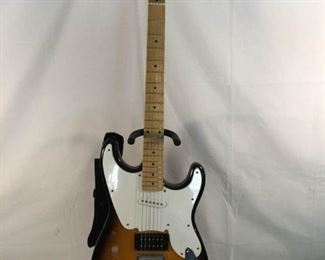 2005 ''Squier'' Guitar by Fender with Strap https://ctbids.com/#!/description/share/236148