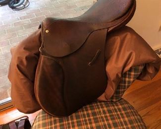 Blue Ribbon Custom Leather Saddle. 16” seat; Hunter/Jumper style MADE IN ENGLAND. Wooden tree; no damage to tree; leather slightly worn. Used (obviously); medium tree no stirrup leathers or irons included; girths of various sizes also available. Circa 1980.