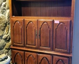 Beautiful two piece bar with lights on two levels, outlet and hook up for cable TV. Wine glass holder, wine bottle holder and lot's of storage in bottom.