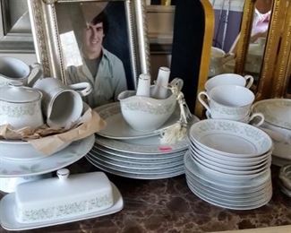 Full Set of China Including Salt and Pepper Shakers, Soup Toureen, Gravy Boat, Butter Dish, Serving Pieces, Cake Stand, Cream and Sugar, Coffee Cups, etc.