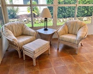 TWO Rattan Arm Chairs - (38W 34D 34H at back)
Rattan Ottoman - (17W 26L)