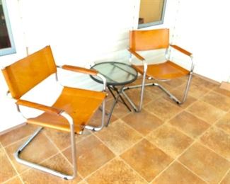 TWO Leather Cantilever Chairs - (24W 20D 29-1/2H at back)