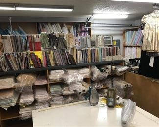 Inside the fabric shop - bolts of fabric, professional displays...