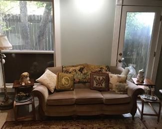 sweet caramel sofa, cool embroidered pillows, mid-century "bamboo" oak side tables, dogs....